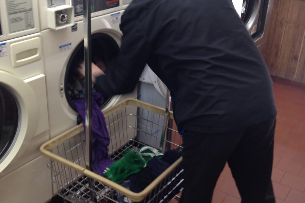 Backpacker washing clothes