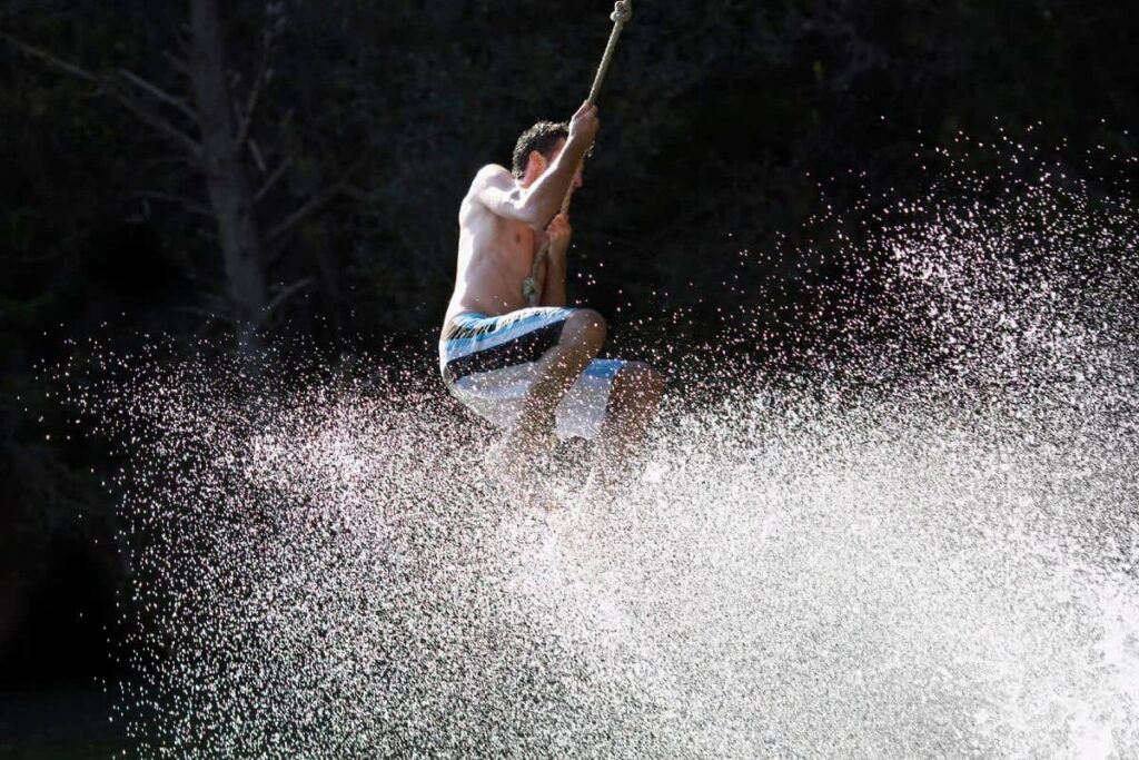 Rope swing in Laos - dangerous backpacking activity