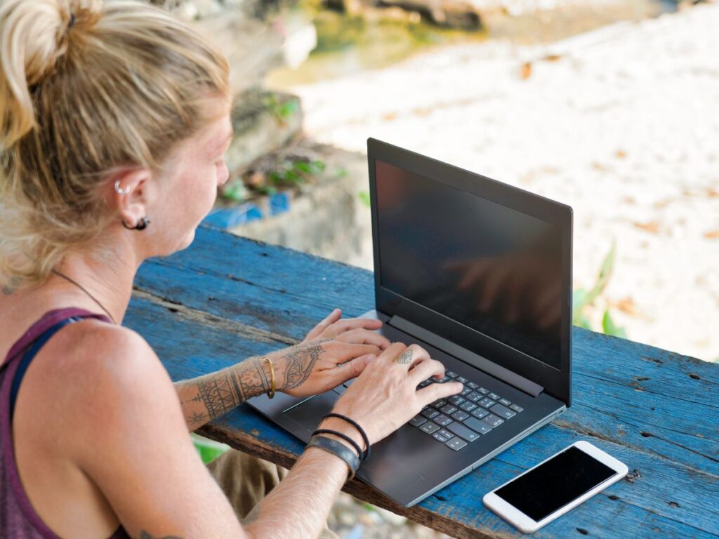 Digital nomad on the beach